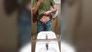 heterosexual dude in blue denim drains off in public wc