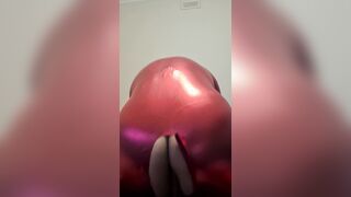 CRIMSON CATSUIT SISSY SITS ON PHAT PECKER