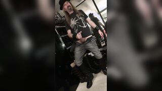 Longhairdude shoots in Wesco Engineer Shoes, dark-hued denim, tshirt, fedora, gauntlets - standby