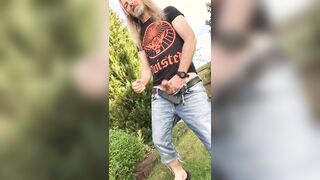 Longhairdude shoots in the garden in trio/four length denim cuttoffs, Crooked tshirt, Adidas sliders