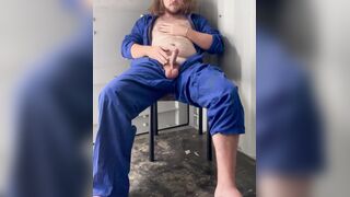 Farm fellow in overalls plays at work