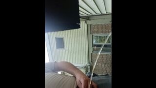 Sean doin yard work n takes a urinate break