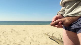 Pissing on a public beach