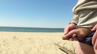 Pissing on a public beach