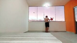 I went up to the terrace and stood bare waiting for someone to witness me in the fresh building.