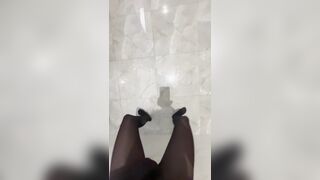 Dressed in dark-hued tights and revealing in the public shower