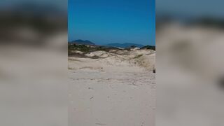 Chilling and flashing my ginormous lollipop at the beach