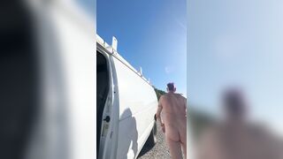 Checking why back camper door rattling. Side of the road. Nude.