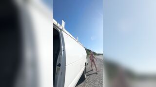 Checking why back camper door rattling. Side of the road. Nude.