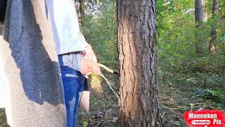 On a walk in the woods, lengthy urinating under a tree