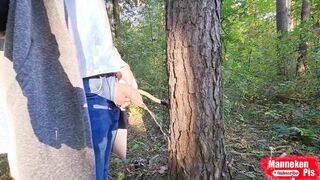 On a walk in the woods, lengthy urinating under a tree