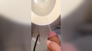 taking a lengthy urinate with a schlong