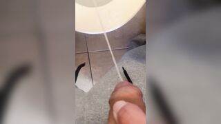 taking a lengthy urinate with a schlong