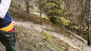 Furry kinky guy with a dick urinates in the spring woods right on camera