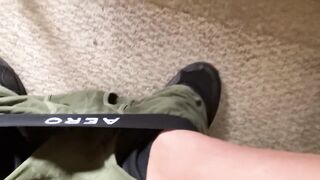 Decorating his sneakers with jizz!