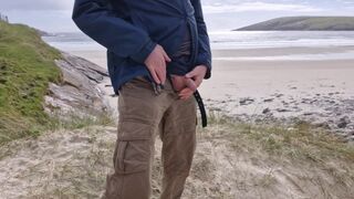 Peeing In Public. Taking A Urinate On The Deprived Island Beach.