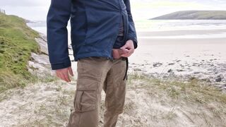 Peeing In Public. Taking A Urinate On The Deprived Island Beach.