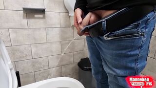 The boy takes a selfie as plentifully lengthy peeing in the rest room