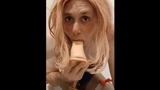 Sissy Alicia fellates lengthy fake penis