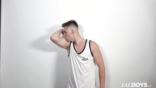 Muscle man Jonathan Hicks displays his six pack