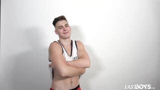 Muscle man Jonathan Hicks displays his six pack