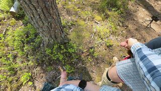 Furry fellow and his uncircumcised acquaintance piss on the side of road in forest next to Tesla truck. Outdoor peeing