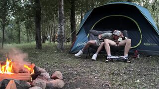 Blowing his mushroom head while camping