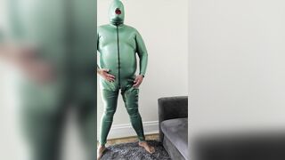 Cum shot in utter emerald green spandex and sheated rubber hood