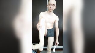 Lean fellow unclothes on camera