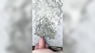 Teenie man urinating on iron in public