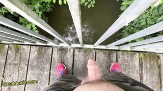 Teenage Stud urinates off the public bridge