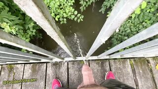Teenage Stud urinates off the public bridge
