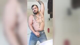 Inked fellow jacks massive meatpipe thru the fly