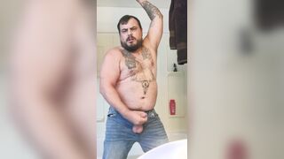 Inked fellow jacks massive meatpipe thru the fly