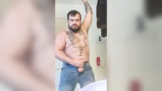 Inked fellow jacks massive meatpipe thru the fly