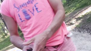 Exhibitionist in rosy clothes disrobed nude in the park and showe bootie