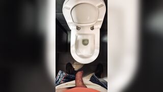 Wooly fellow with an uncircumcised spunk-pump pissed in a public rest room at a gas station. Homosexual peeing porno