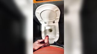 Wooly fellow with an uncircumcised spunk-pump pissed in a public rest room at a gas station. Homosexual peeing porno