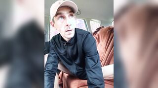 fellow is having a fine time in the back seat of the camper.