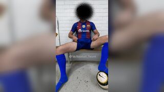 Jerkoff in the baseball locker apartment dressed in football kit