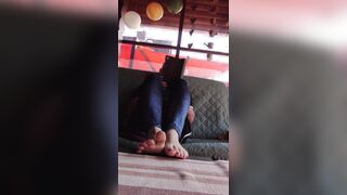 Barefooted on the porch table