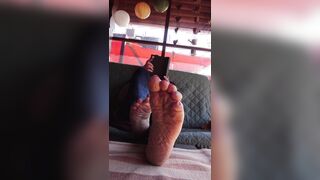 Barefooted on the porch table