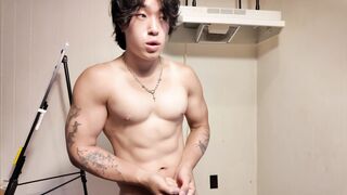 Torn Japanese Man Flexing While Displaying His Goods
