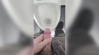 Pissing in urinal