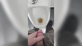 Pissing in urinal
